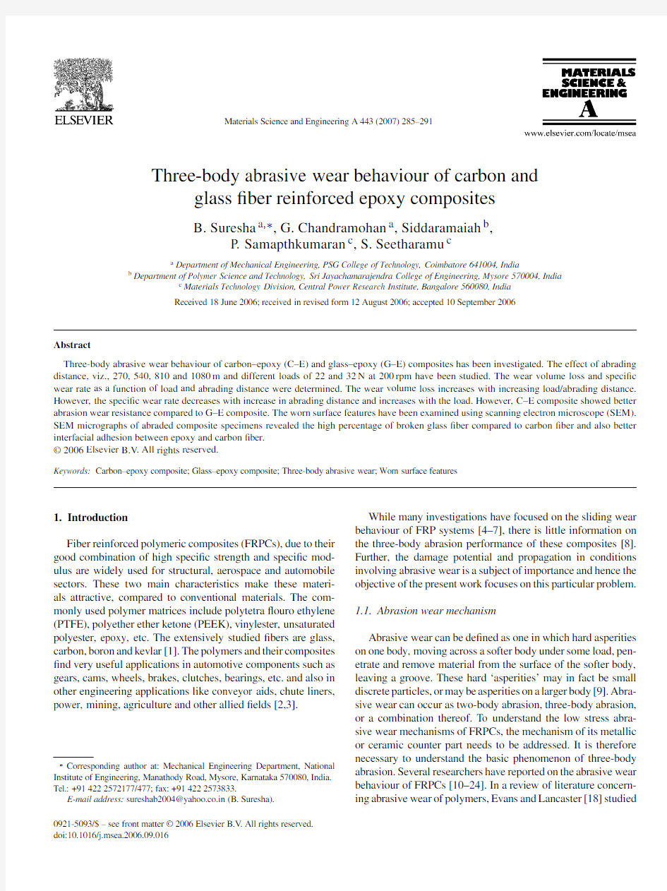 Three-body Abrasive Wear Behaviour of Carbon and Glass Fiber Reinforced Epoxy Composites